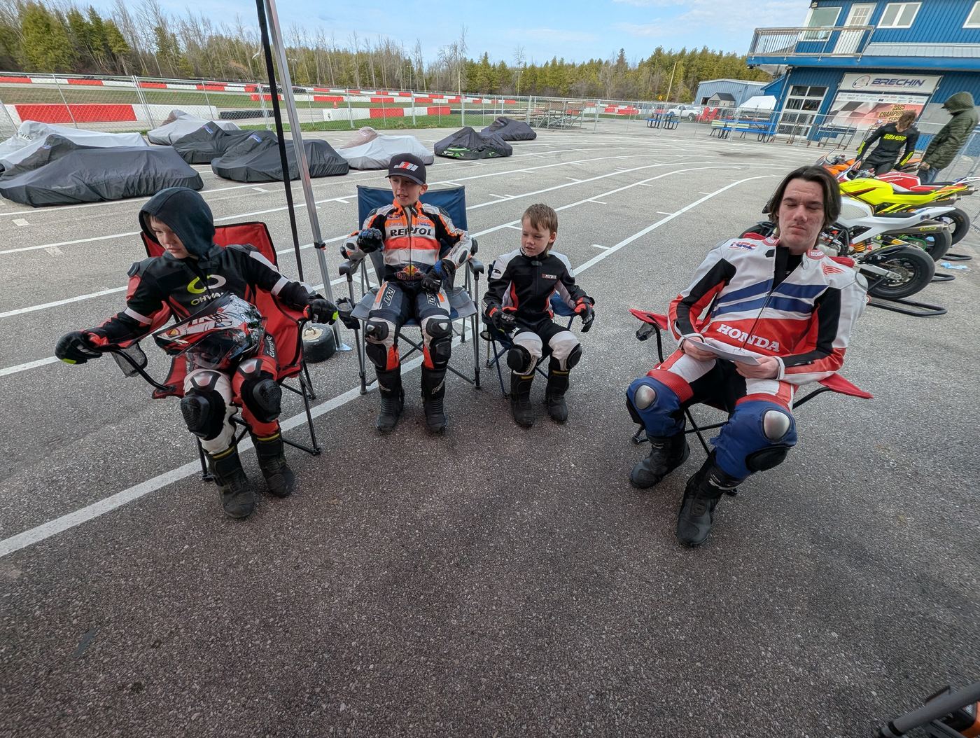 Waiting out a stint in the Brechin paddock, still in full leathers
