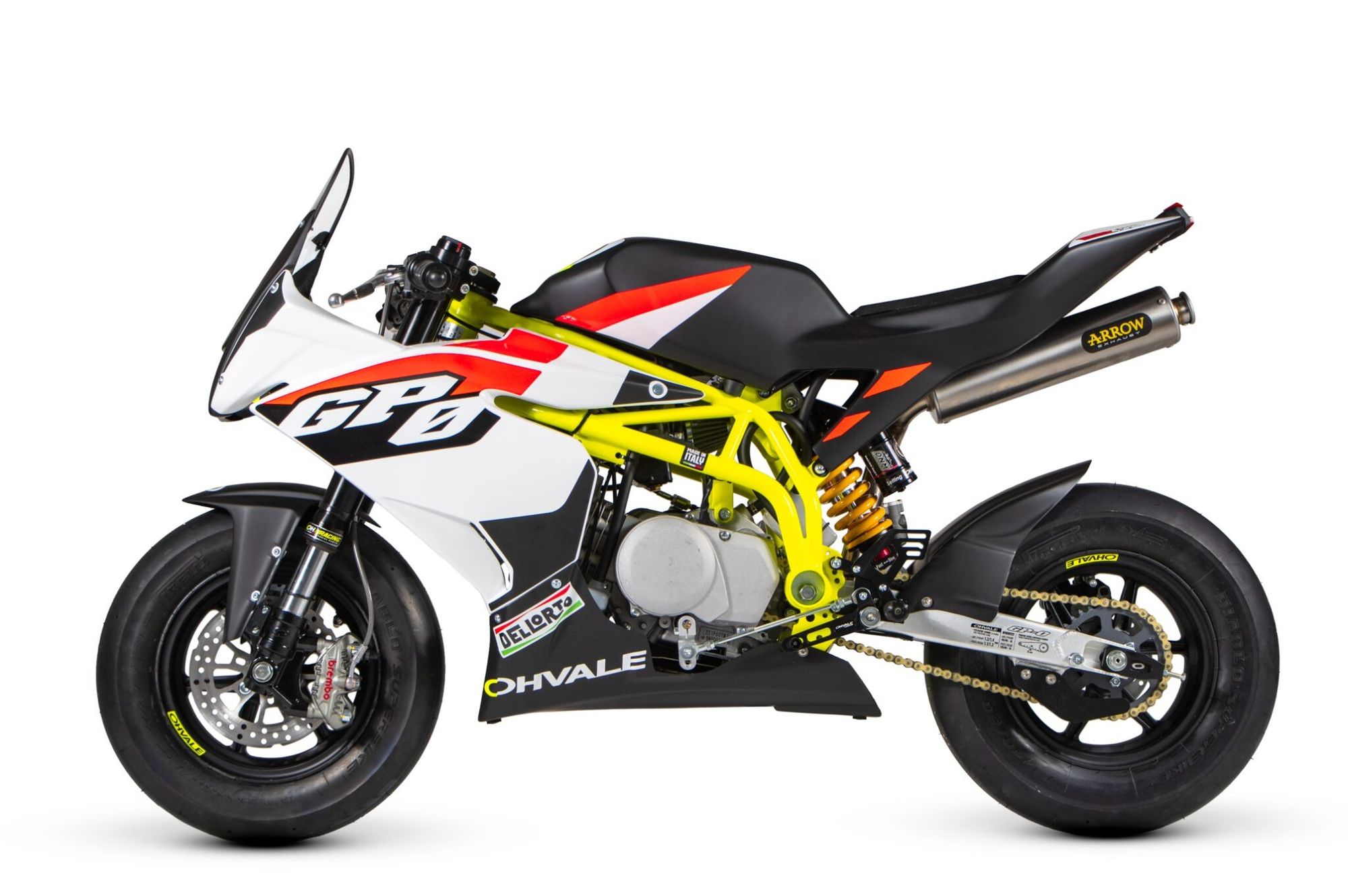 The Ohvale GP-0 in left-side profile, official manufacturer photo showing the white and yellow livery, Arrow exhaust and Brembo front brake