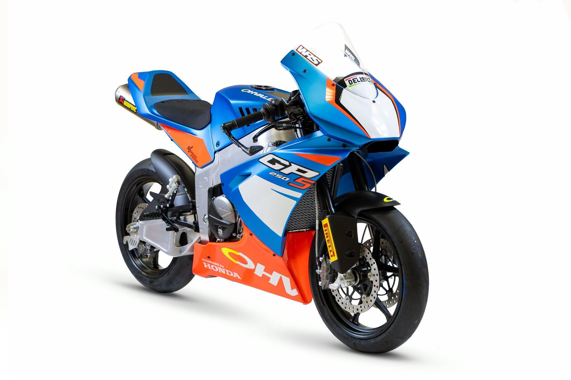 The Ohvale GP-5 250 from a three-quarter front angle, showing the Brembo front brake, Pirelli tyre and Honda-powered engine bay